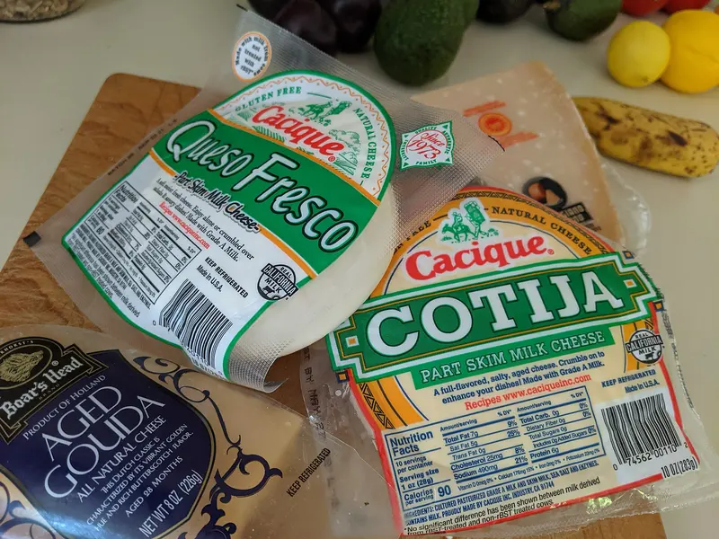 Assorted cheeses featuring cacique, near La Selva Beach