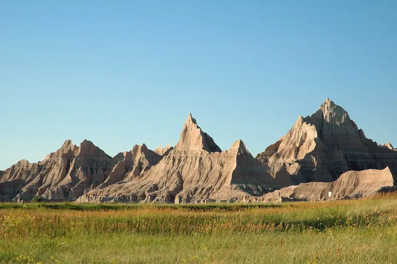 View of badland formations during golden hour from Cedar Pass Campground, Badlands National Park