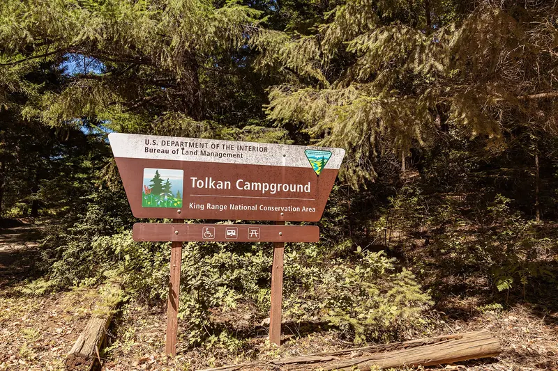 Photo: Tony Webster from Minneapolis, Minnesota, United States / CC BY-SA 2.0, via Wikimedia Commons Tolkan Campground Sign - Bureau of Land Management, California