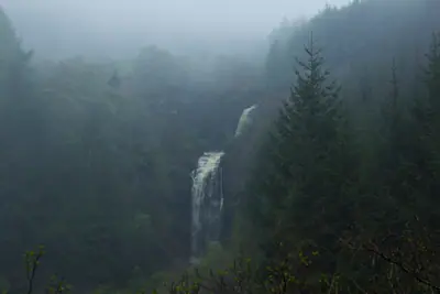 A Distant Shot Through Haze And Rain At Glenashdale Falls, Isle of Arran