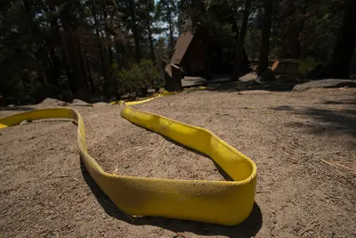 Cedar Fire - Fire Hoses wilted, near Alta Sierra
