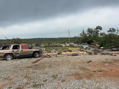 A double-wide mobile home that was destroyed by an EF2 tornado in Runaway Bay, Texas