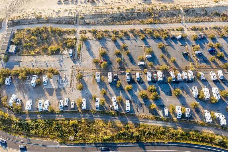 Photo: Raimond Spekking / CC BY-SA 4.0, via Wikimedia Commons Emplacement pour camping-car des 3 Digues, Sète - aerial view